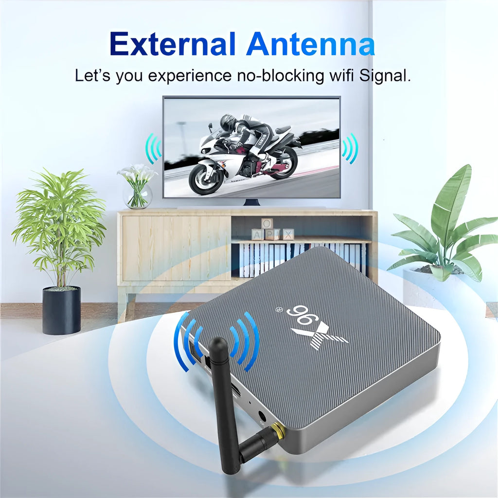 Android smart TV set-top box with voice remote control on a wooden table.