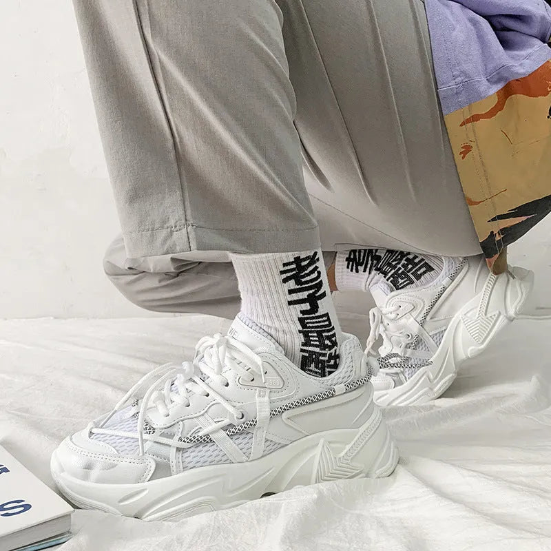 Men's white Korean style platform dad shoes with front lace-up and chunky sole on a plain background.