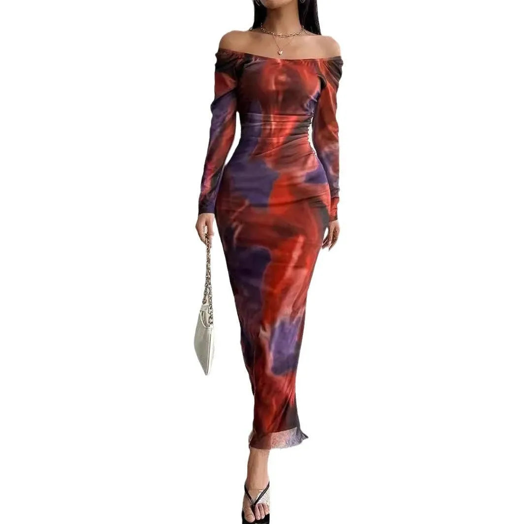 Women's long green mesh dress with fishtail skirt, gradient colour print, pleats, and a square neckline.