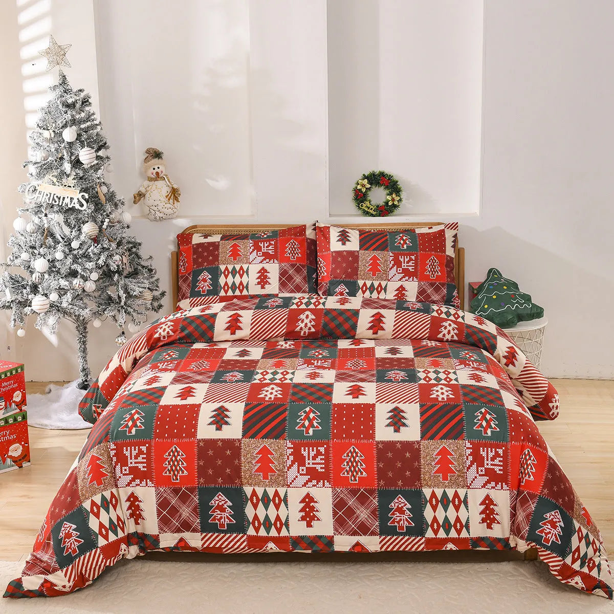 Red and white plaid Christmas pattern quilt cover and pillowcases on a bed.