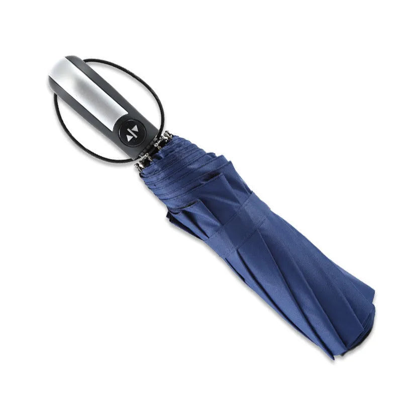 Triple-folding automatic business umbrella with steel frame and rubber handle in black, navy, or wine red.