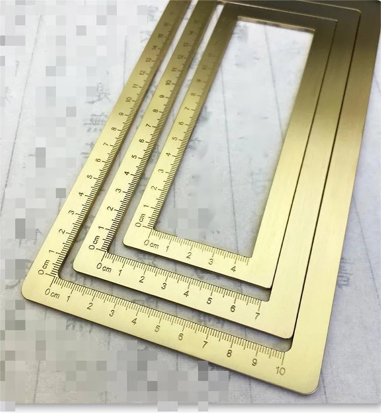 Solid brass calligraphy weight brush and paper scale with decorative carved designs
