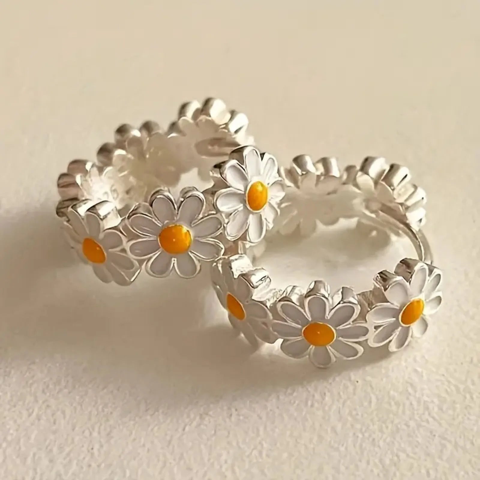 White daisy flower ring earrings with electroplated copper construction and platinum gem details