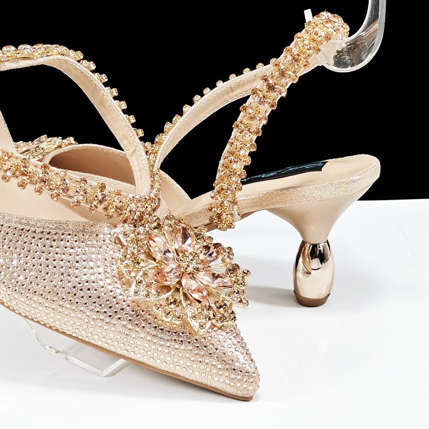 Women's high heel shoe and clutch bag set with decorative floral ankle chain in multiple colour options