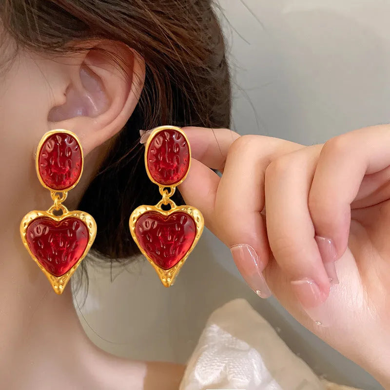 Silver needle pleated oval love heart stud earrings in purple, red, green, and yellow and white colours.