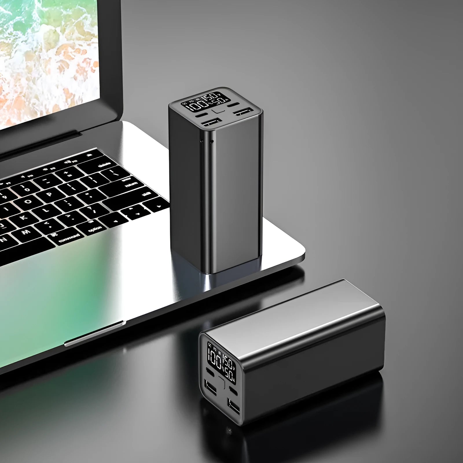 High power laptop charging bank with metal casing showing dimensions 47.5 x 104.5 x 47.5mm