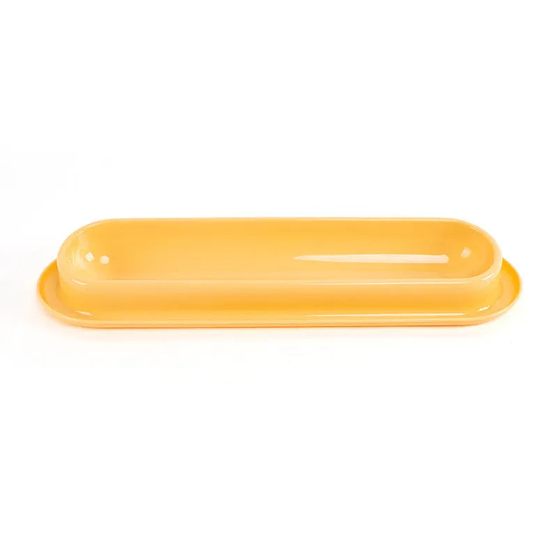 Green partitioned pet feeder bowl with four sections for dog or cat dry food.