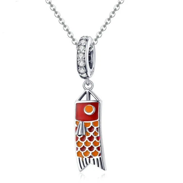 S925 sterling silver carp streamer pendant with oxidised finish, zircon stone, and oil drop decoration.