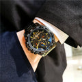 Men's automatic mechanical watch showing 12mm thickness with black steel, natural silver, and gold steel colour options
