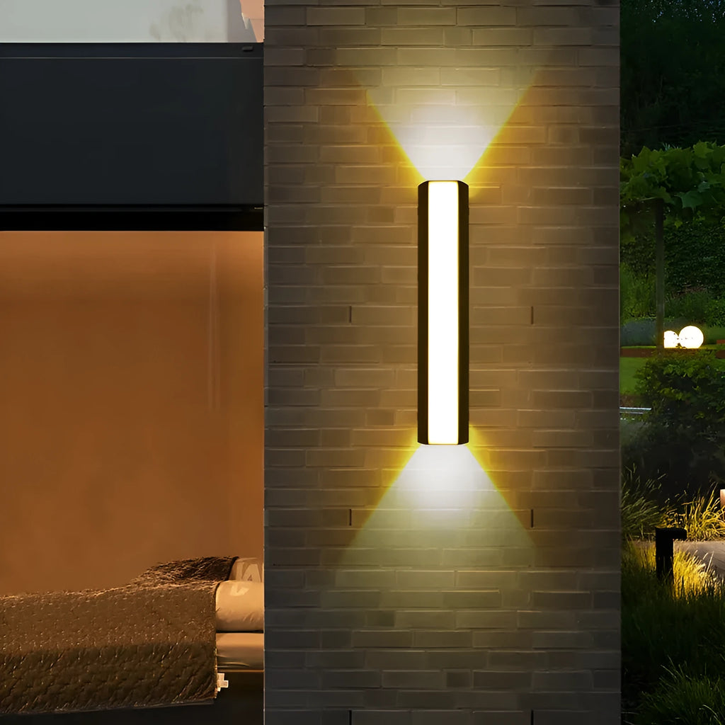 Simple modern outdoor waterproof LED wall lamp in black aluminium with glass panel for garden or patio