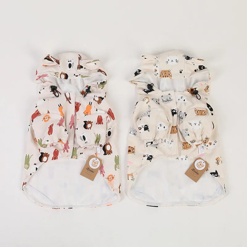 Beige dog raincoat with cartoon design in waterproof PU material