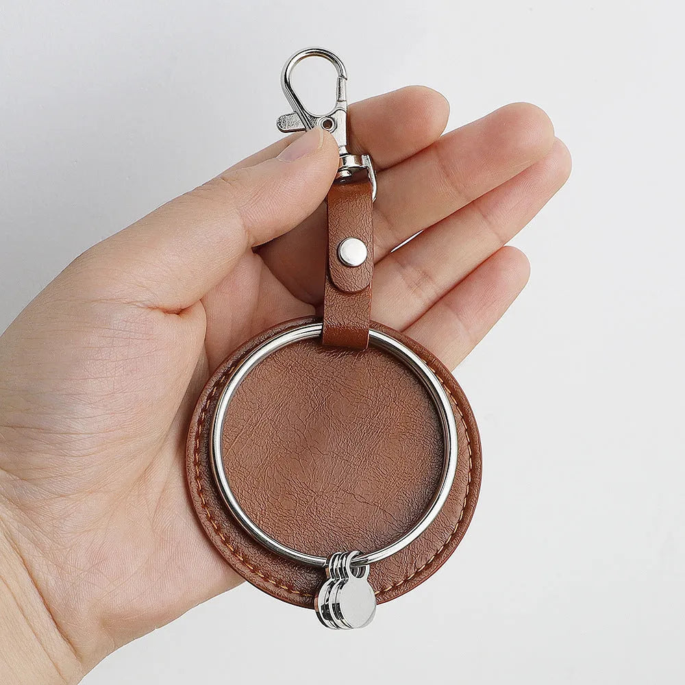 Round genuine leather keychain pendant with cross crown Roman numerals design steel-coloured gloss finish stainless steel key ring
