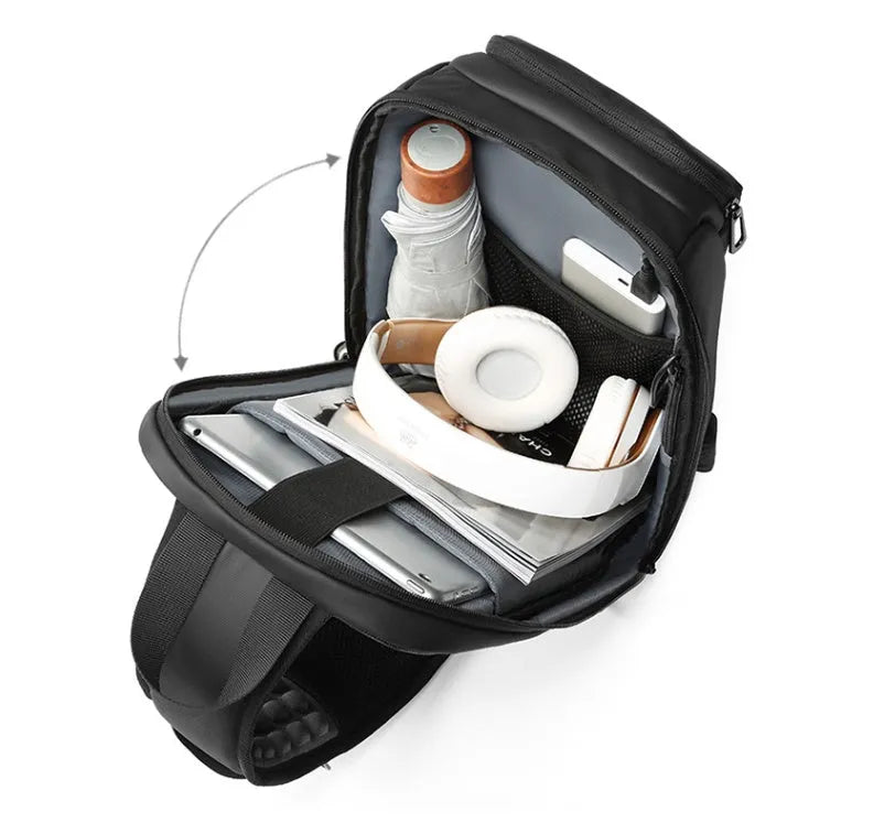Black medium-sized PVC outdoor shoulder bag showing front view and interior laptop compartment.