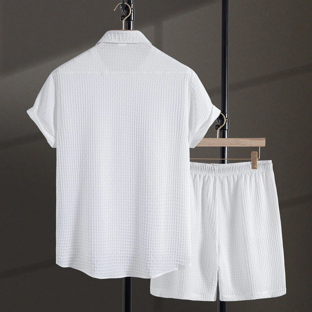 Men's loose fit cotton blend beach suit with short sleeve shirt and shorts in black.