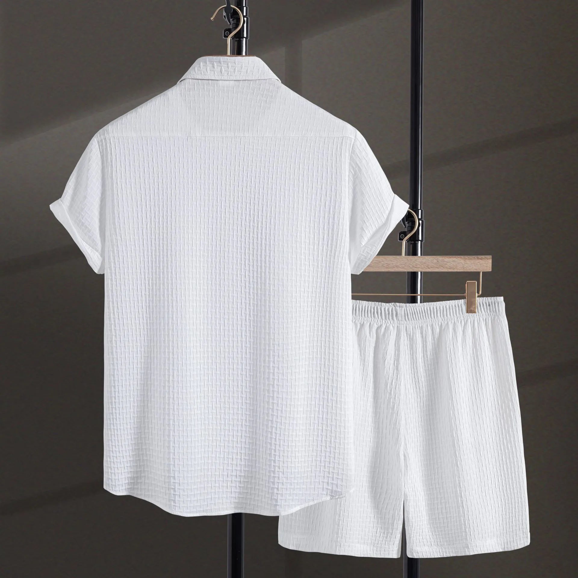 Men's loose fit cotton blend beach suit with short sleeve shirt and shorts in black.
