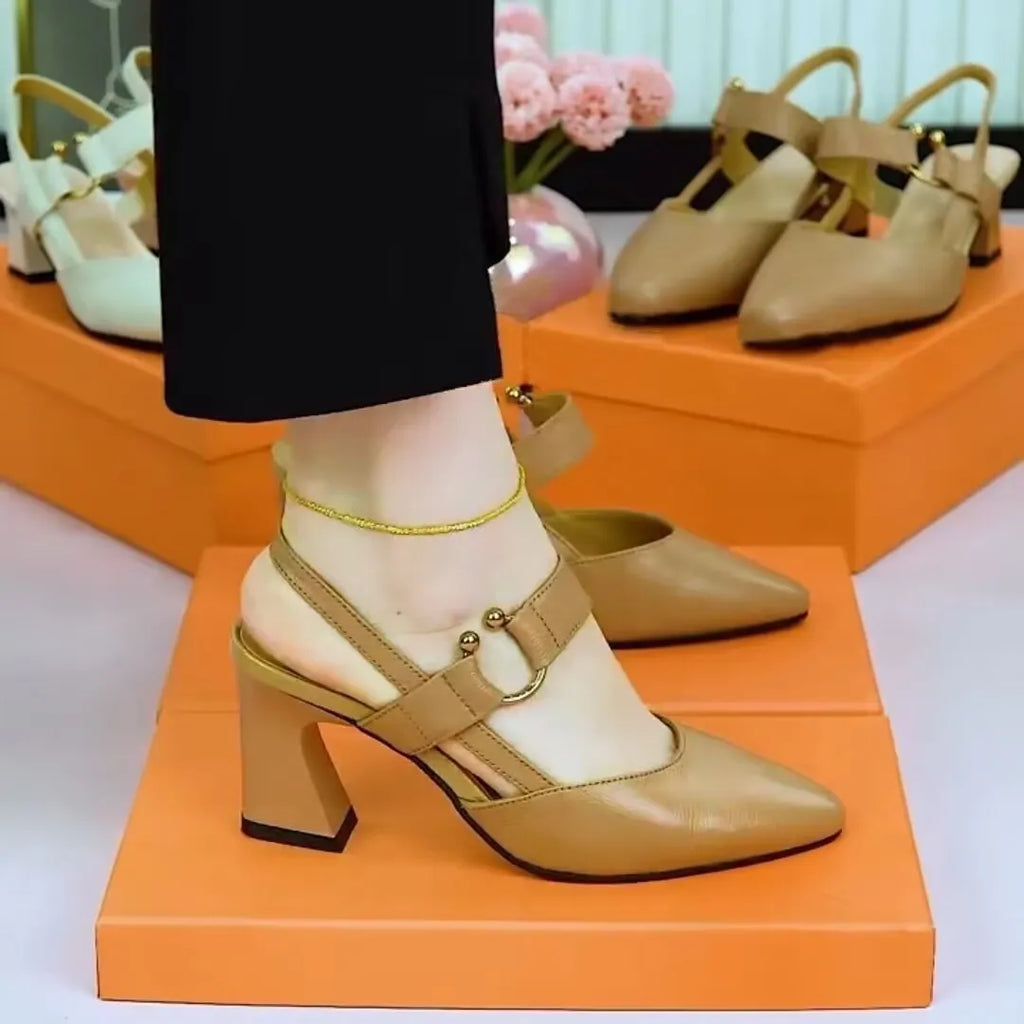 Women's apricot coloured pigskin leather sandals with a closed toe, back, and chunky heel.