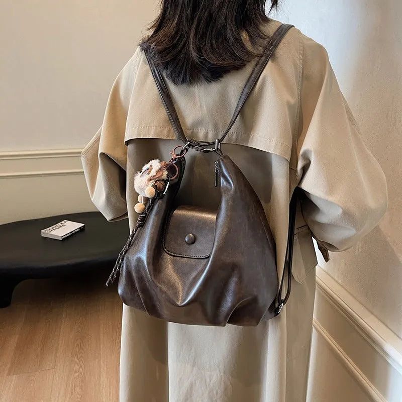 Women's PU leather shoulder bag with single strap in urban simplicity style showing horizontal square shape