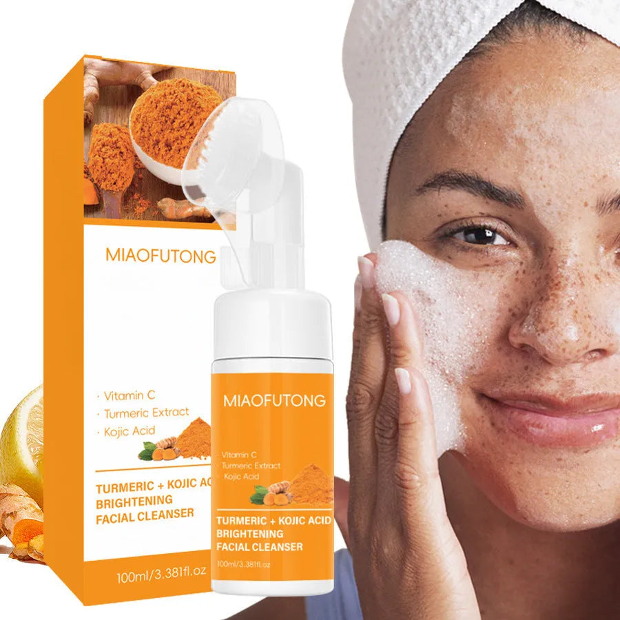 Turmeric facial cleansing set showing mousse tube, disposable pads, ginger soap bar with net, and additional components