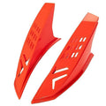A pair of coloured adhesive-backed horns for decorating a child's motorcycle or ski helmet.