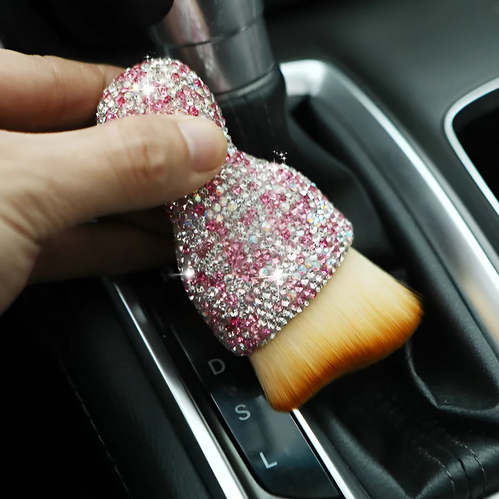 Compact white PVC car interior cleaning brush for dusting dashboard and vents.