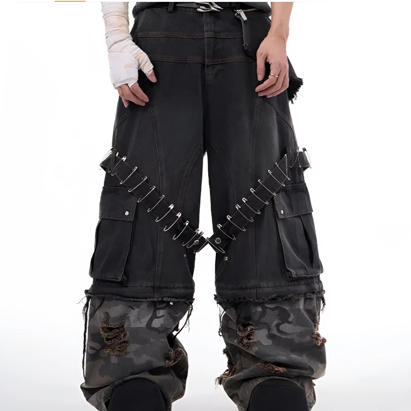 Grey men's camouflage jeans with splicing construction and pin details on cotton denim fabric