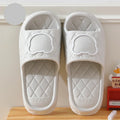 Rhombus design bear slippers in EVA with non-slip thick sole, shown in black, green, grey, khaki, pink, white, and yellow.
