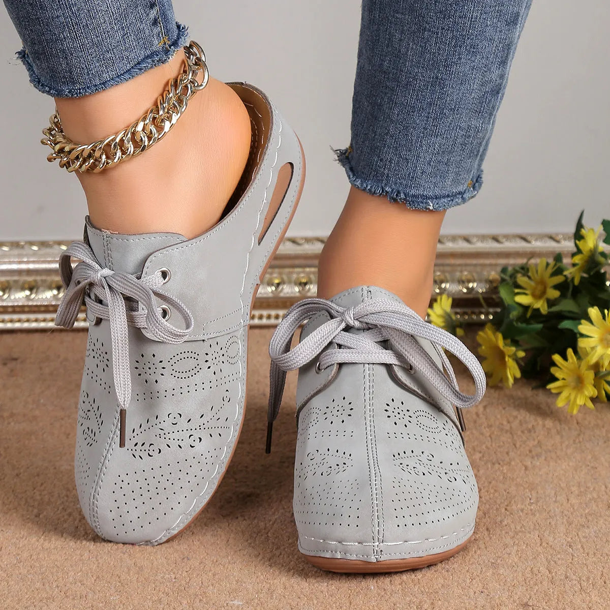 Women's baotou lace-up slippers with hollow-out wedge design in suede and rubber construction