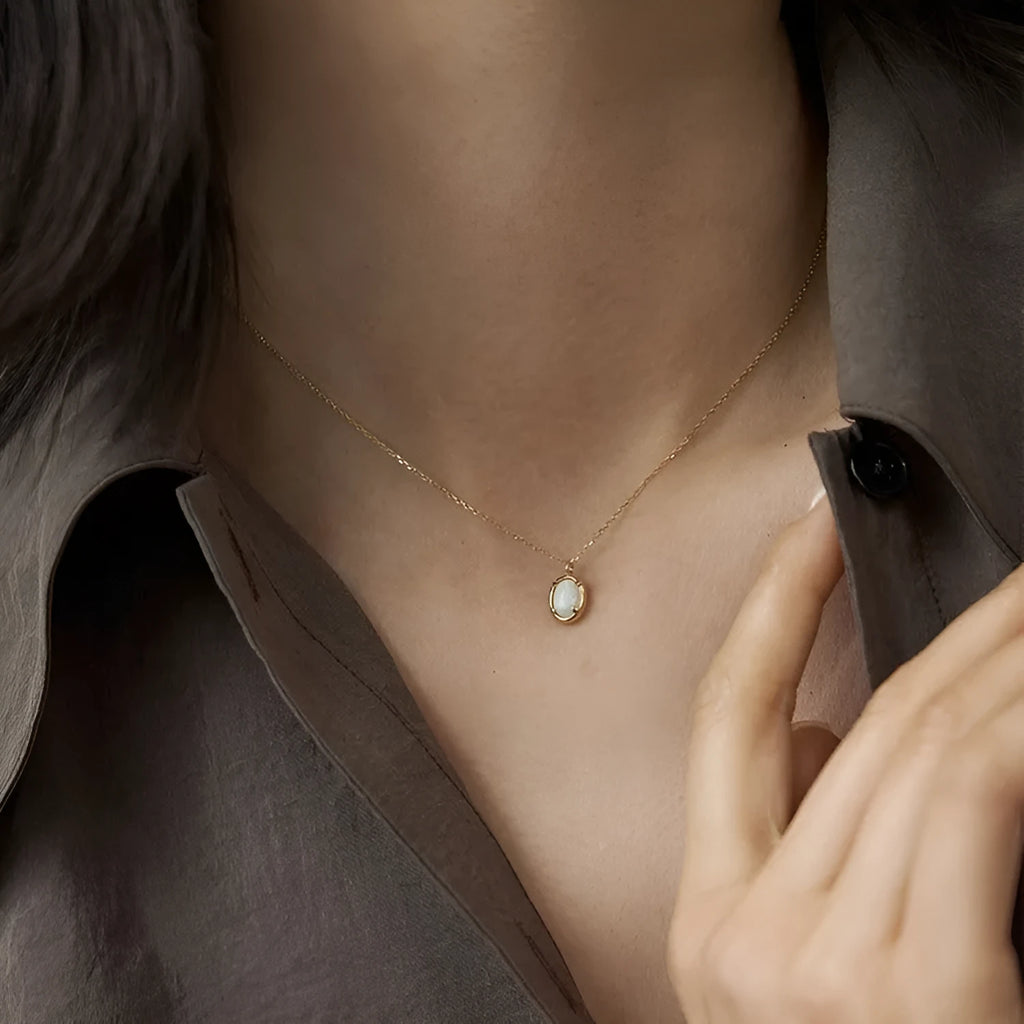 Geometric oval pendant necklace with jelly opal stone in silver setting with gold or white gold finish