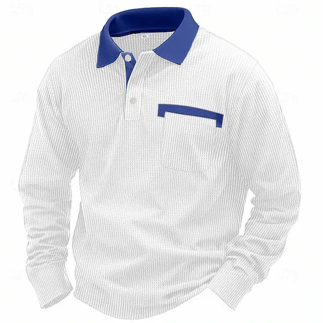 Man wearing a loose-fit long-sleeved polo shirt with a waffle knit texture in a dark blue colour.