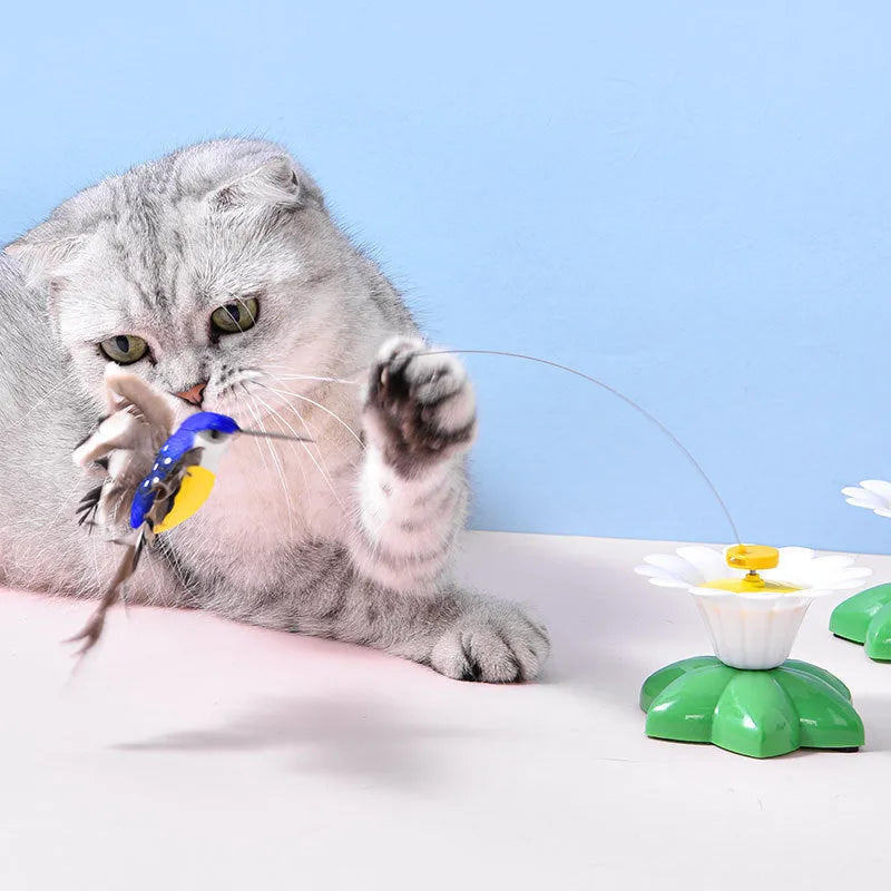 Automatic cat teaser electric rotation toy with bird and butterfly attachments, plastic construction