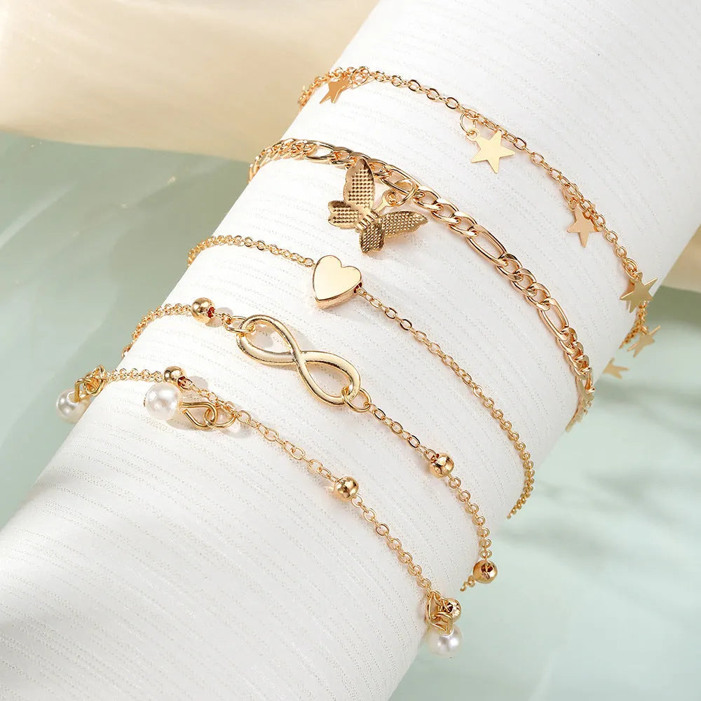 Butterfly love anklet set with four different alloy foot chains featuring heart and pearl charms