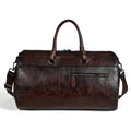 Handmade retro style leather bag in vintage brown colour showing first layer cowhide texture and large capacity design