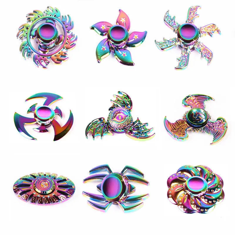 Colourful alloy fidget spinner with six axis design and electroplated finish on a light background
