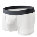 Men's solid colour ice silk boxer shorts on a white background, showing low waist design.