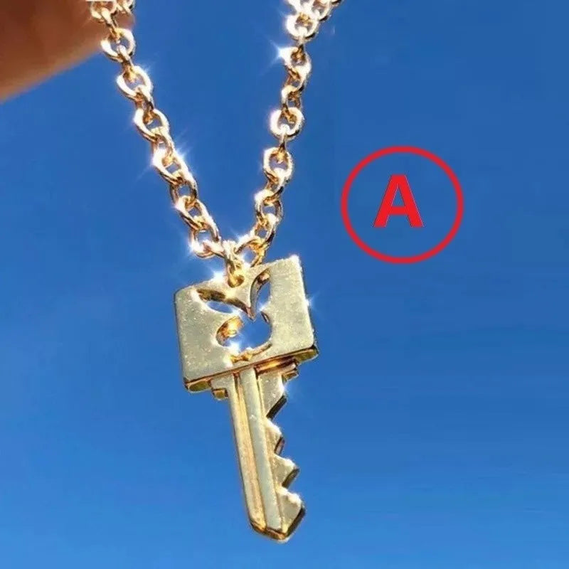 Shiny alloy key lock pendant necklace with geometric shape and electroplated finish on white background