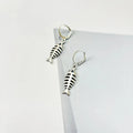 Fishbone motif pendant necklace and matching earrings set in retro-style alloy jewellery with adjustable chain.