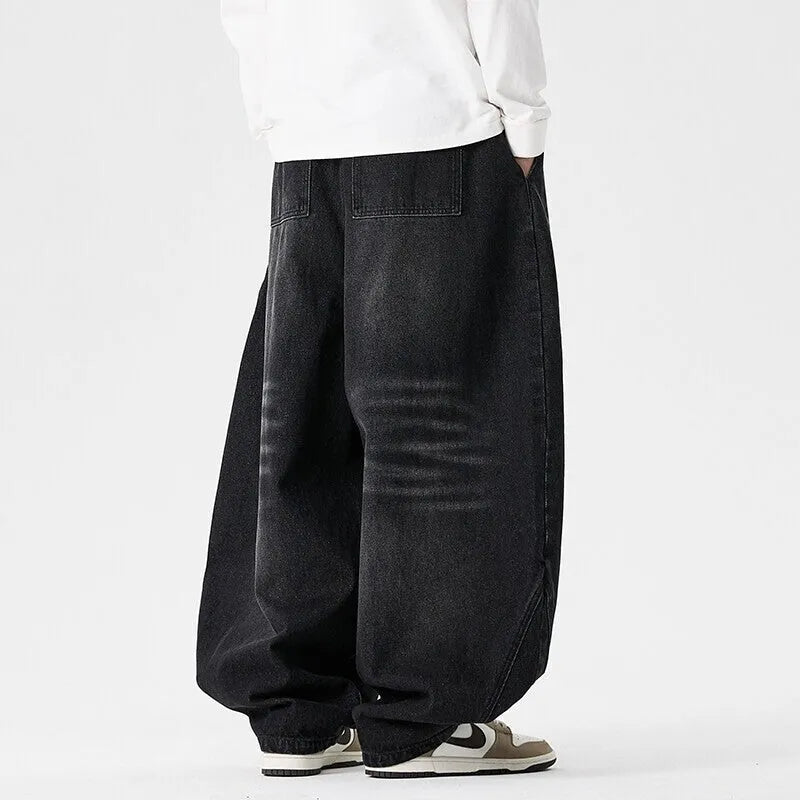 Men's plus size baggy jeans in light blue, dark blue, and black with wide leg straight cut design