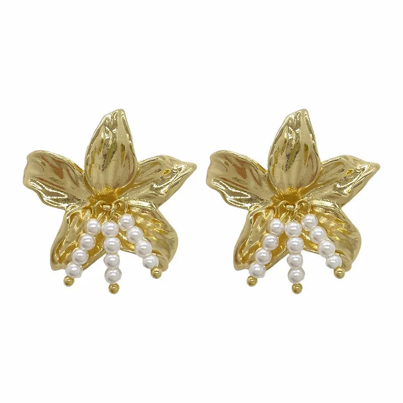 Gold floral pearl earrings with exaggerated design and Seiko-treated metal construction