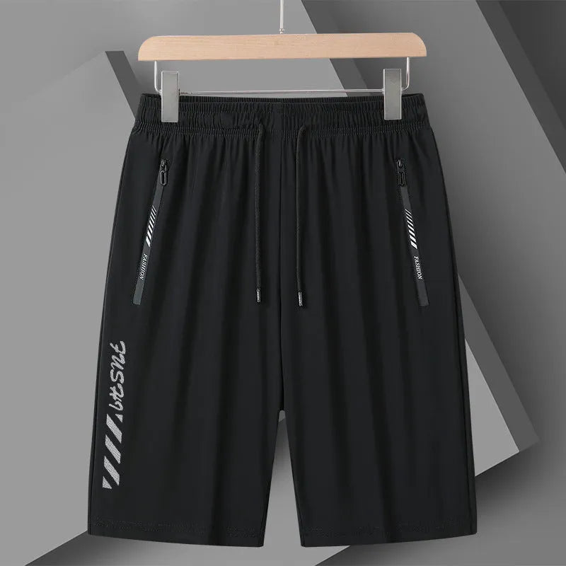 Men's quick-drying nylon sports shorts in loose fit with elastic waistband