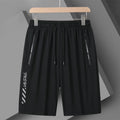 Men's quick-drying nylon sports shorts in loose fit with elastic waistband
