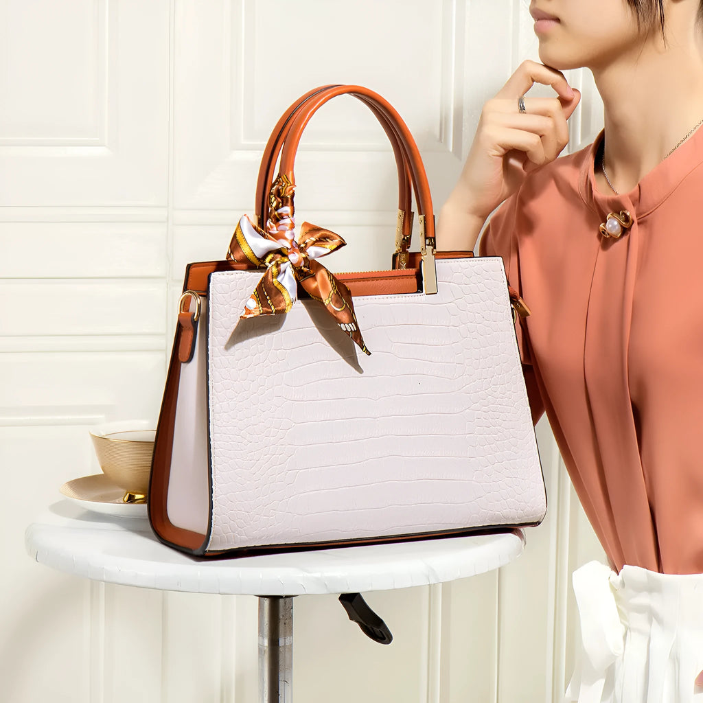 Milky white women's PU shoulder handbag with organised internal compartments on a plain background.