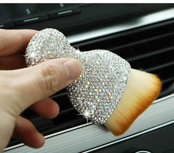 Compact white PVC car interior cleaning brush for dusting dashboard and vents.