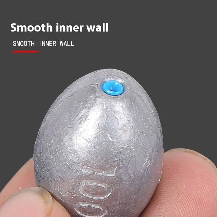 Tongxin olive lead fishing sinker with scale pattern, rugby shape, and plastic core in various weights