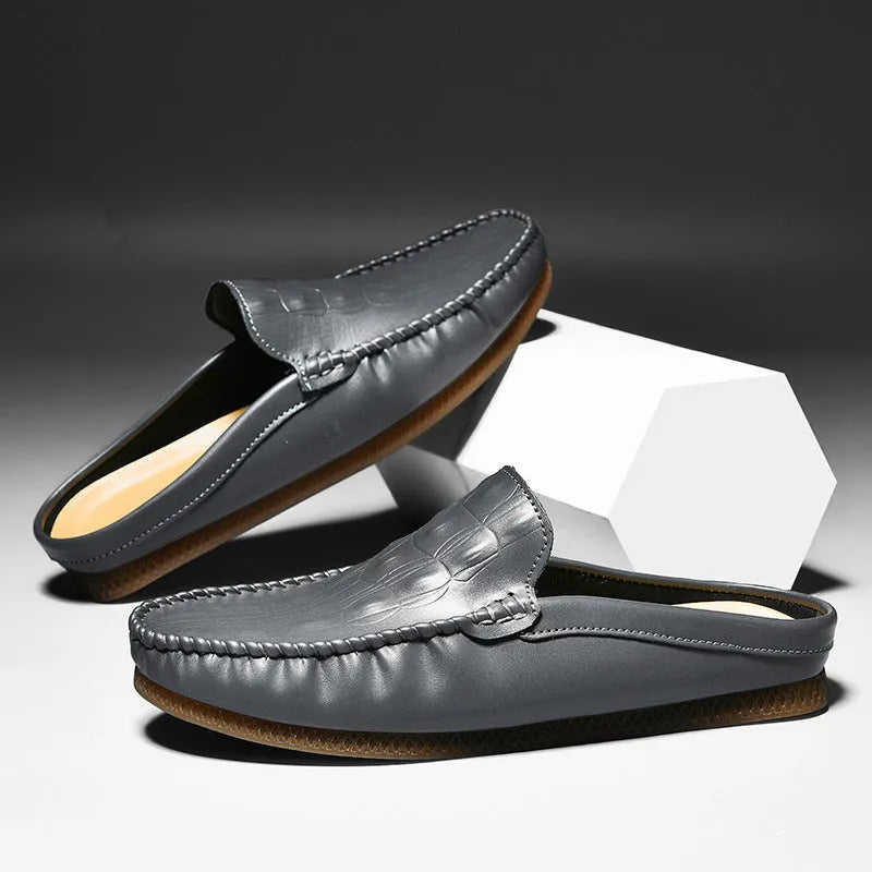 Men's black breathable Gommino semi-slippers with artificial PU upper and rubber sole on a white background