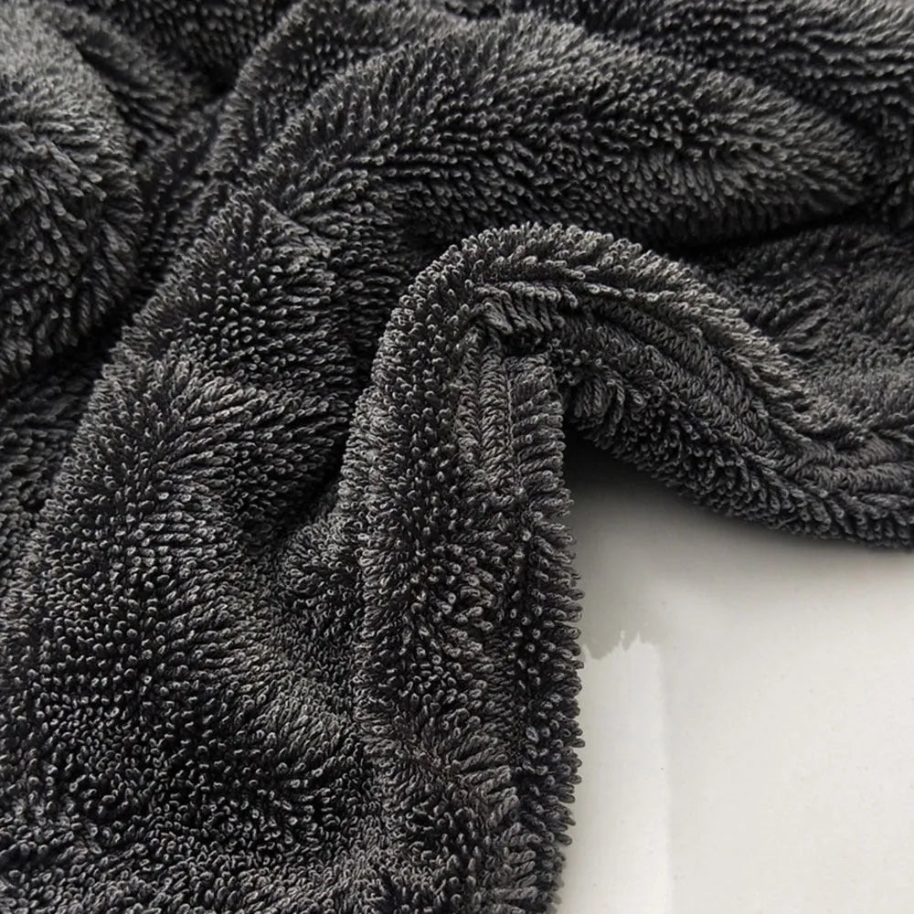 Grey 40cm by 40cm microfiber car drying towel laid flat.