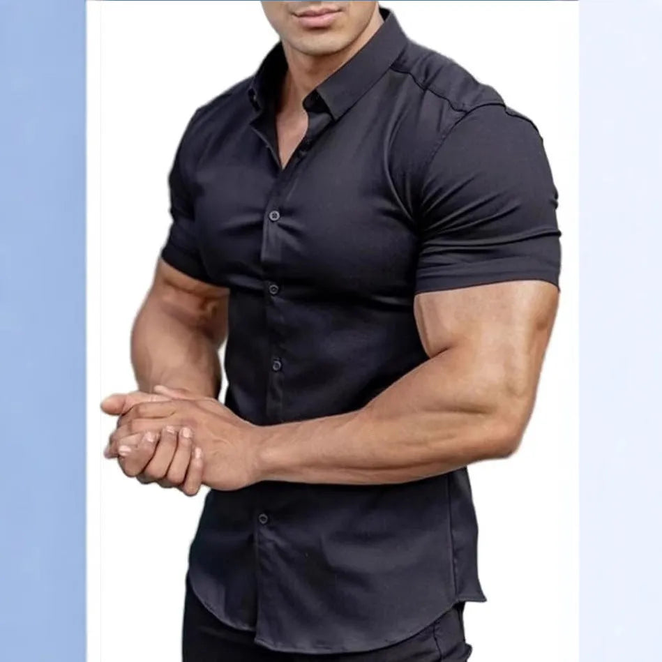 Man wearing a brown short sleeve casual printed shirt with a collar.