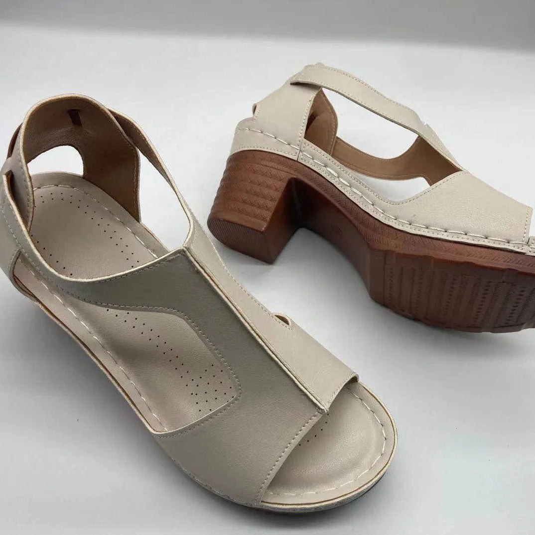 Peep toe wedge sandals with Roman style buckle and fish mouth open toe design in creamy-white colour