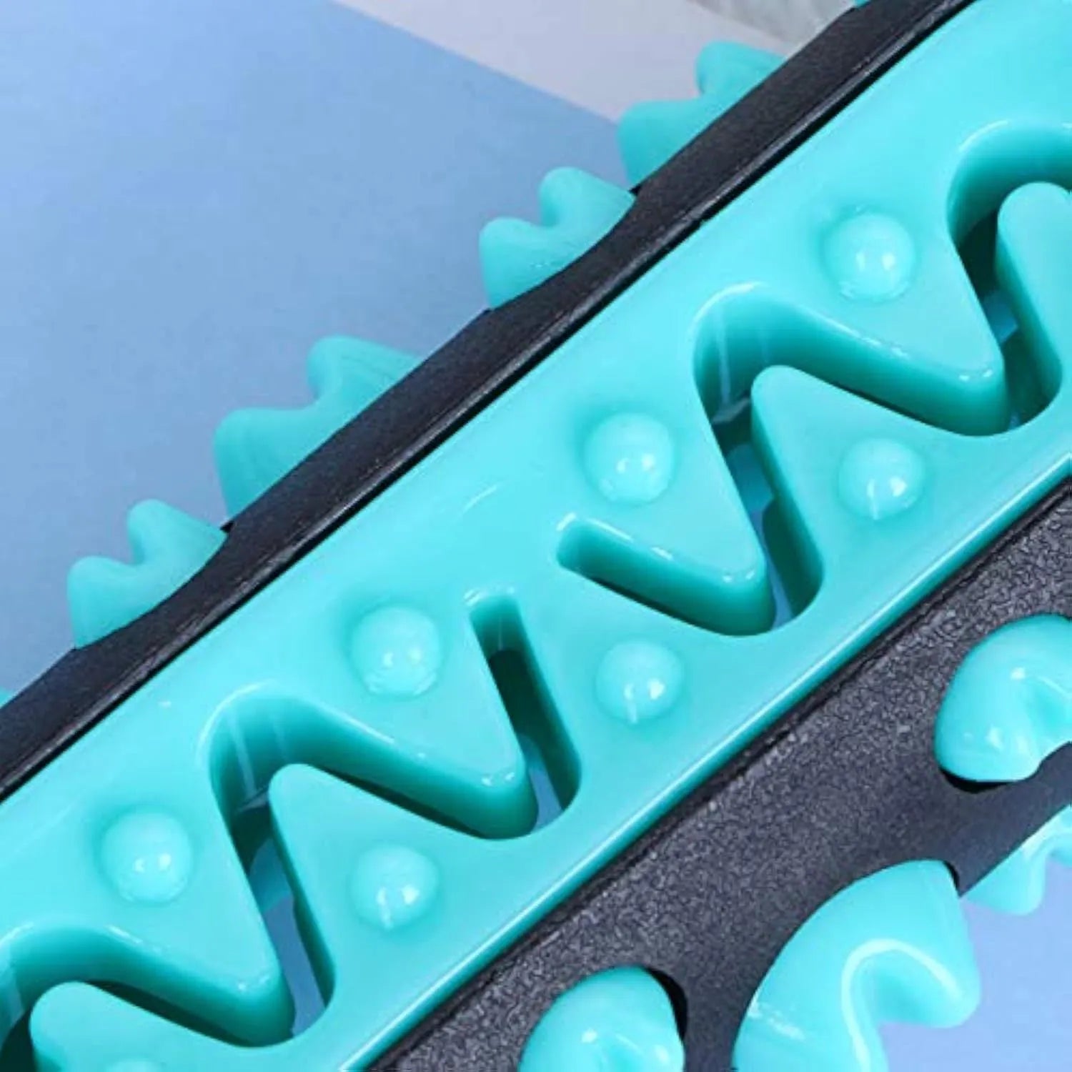 Natural rubber dog toothbrush chew toy for dental cleaning in blue green yellow or black colours