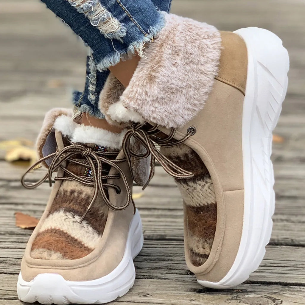 Women's beige lace-up snow boots with suede upper and thermal plush lining on a rubber sole.