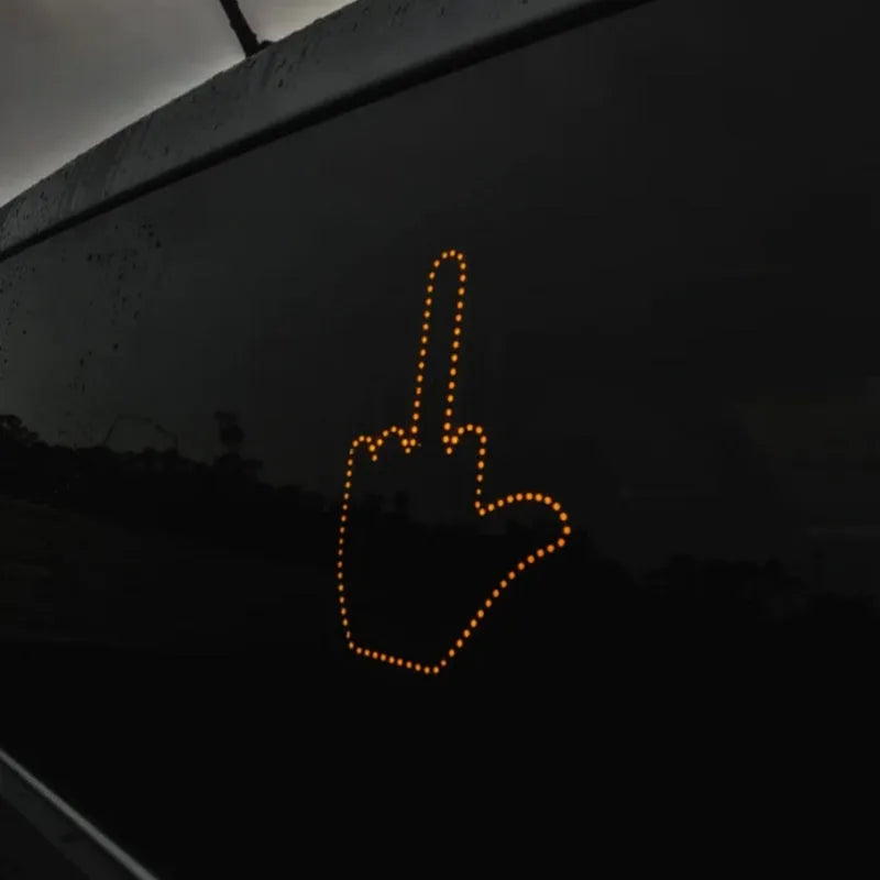 Black plastic LED gesture car light with remote control showing three-finger gesture